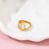 18k Gold Plated Jane Ring placed on different background