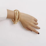 Statement Snake Chain Coil Bracelet wore on a hand