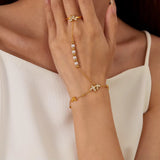 18K Gold Plated Pearl Butterfly Hand Chain wore on left hand