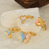 Four 18k Gold Plated Summery Rings placed on different background