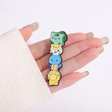 Cute Pokemon Brooch Enamel Pin holding in a hand